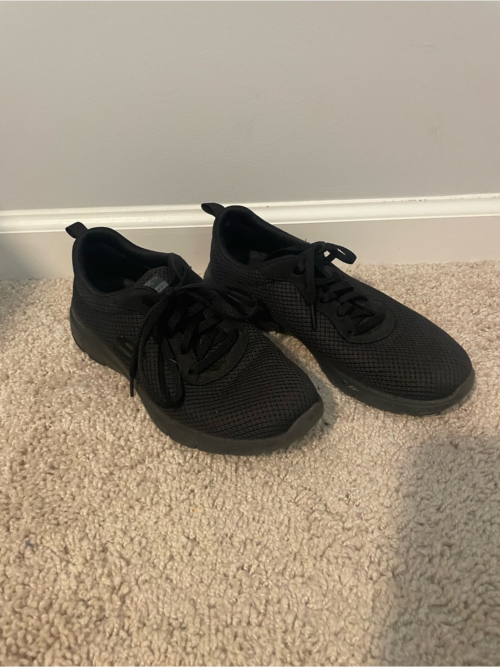 Skechers All-Black Knit Lace-Up Sneakers